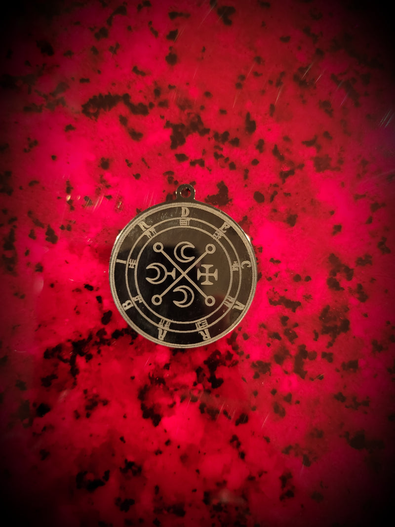 black decarabia pendant